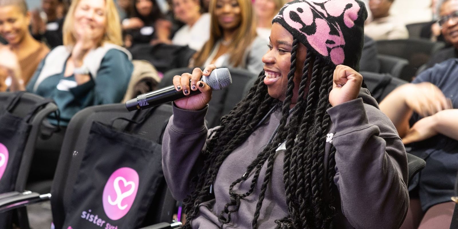 Sister System person in meeting